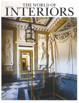 Magazine cover titled the world of interiors showing a grand ornate room with classical carvings