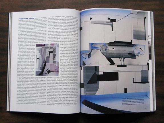 Magazine article about a sculptural kitchen installation with black line graphics