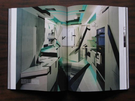 Open magazine displaying a futuristic kitchen with sharp white panels and cyan lighting